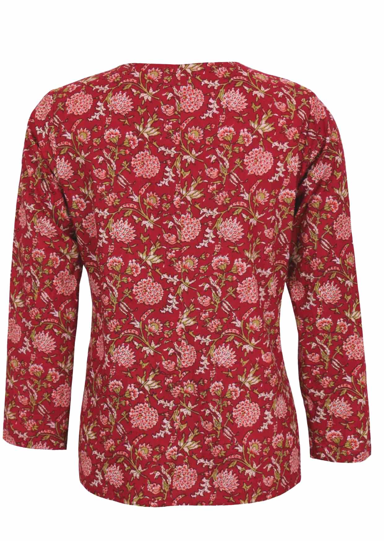 Back image of 100% cotton top with pink,white, and green floral print on red cranberry base.
