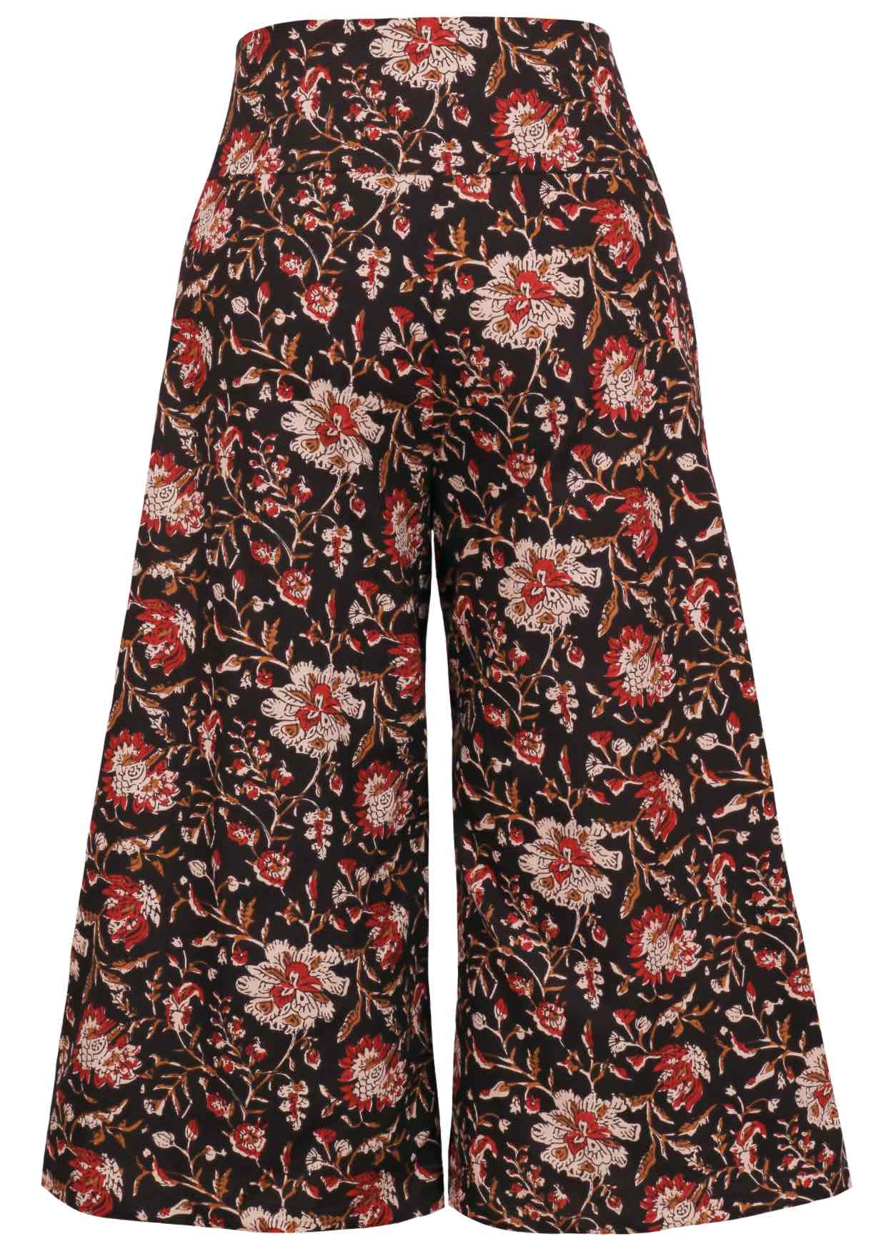 Back view of cotton wide leg printed pants in 3/4 length with pockets and side zipper