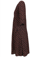 Lightweight cotton 3/4 sleeved dress with empire waist and pockets.