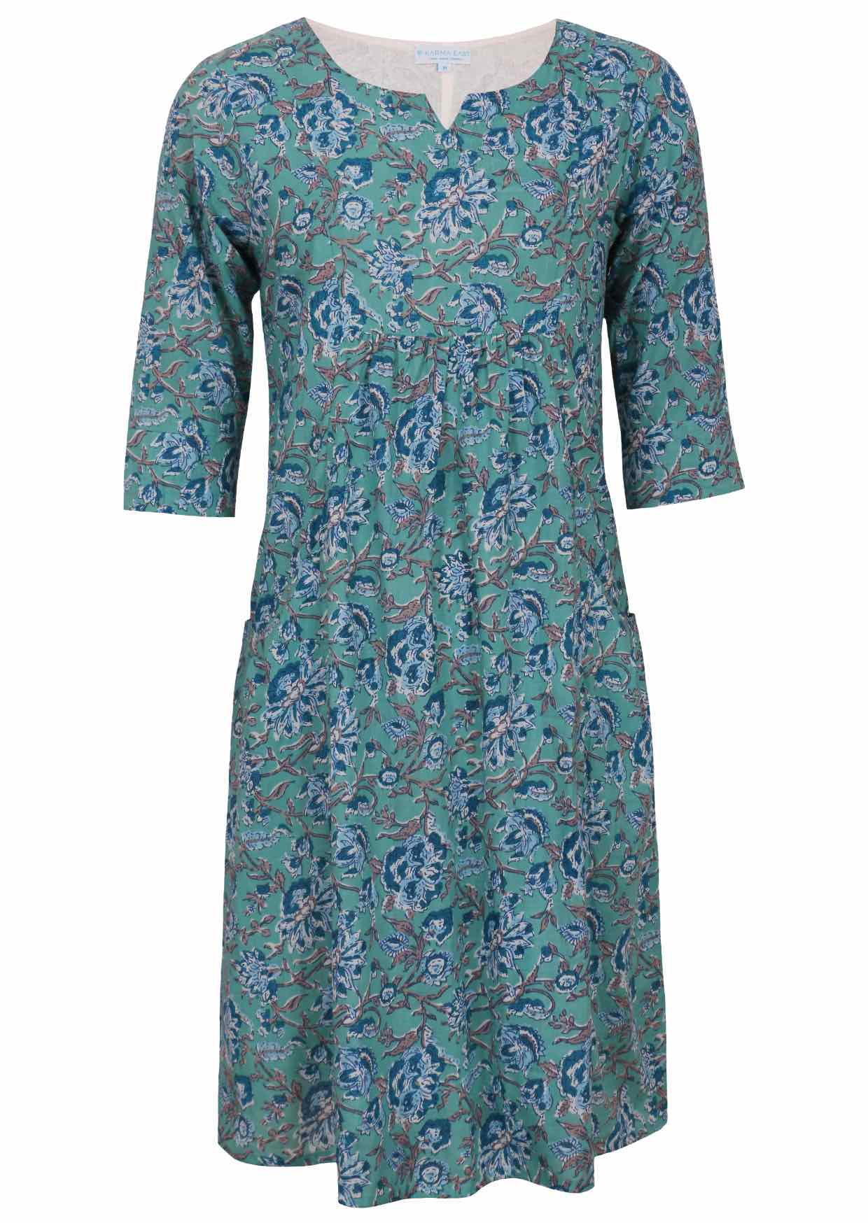 Relaxed fit below knee length cotton dress with 3/4 sleeves, pockets and round neckline.