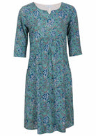 Relaxed fit below knee length cotton dress with 3/4 sleeves, pockets and round neckline.