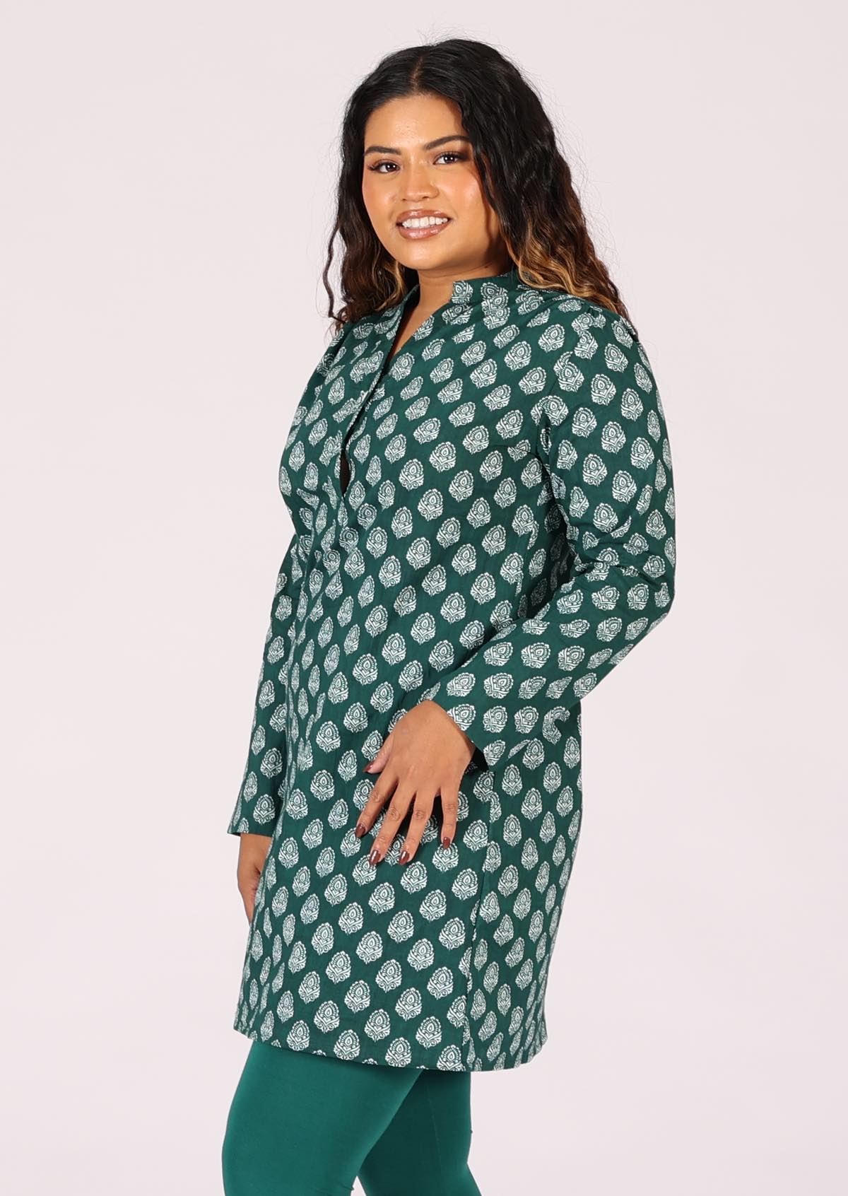 White pendant print on dark green base cotton long sleeve tunic