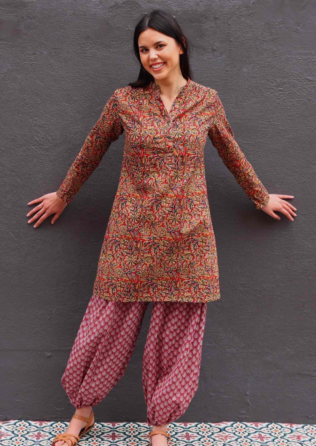 woman wearing 100% cotton Indian Print Tunic over harem pants in warm Indian prints