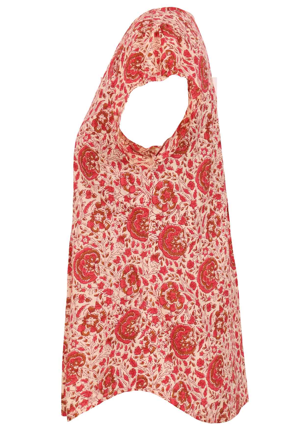 Side view of cream based warm floral print cotton top with cap sleeves.