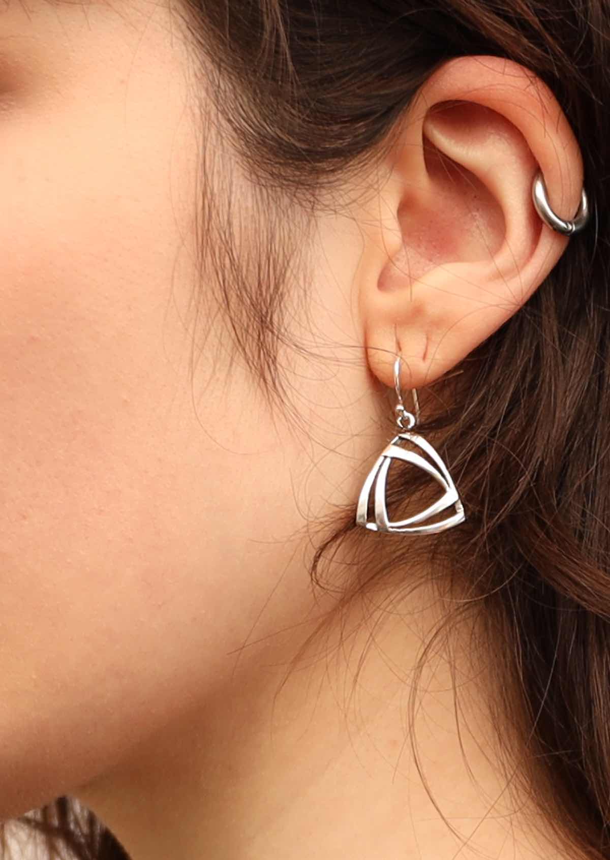 Model wearing 92.5% silver triangle earrings