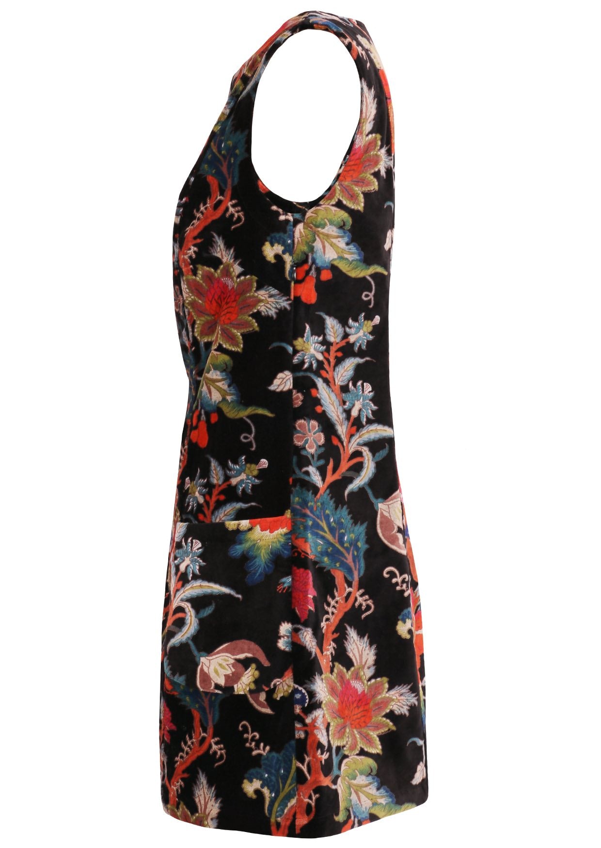 Side view of black based multi-coloured floral print cotton velvet sleeveless tunic with pockets and side zip