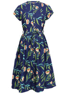 Mannequin front of dress.