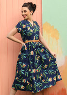 Model wears 100% cotton dress.