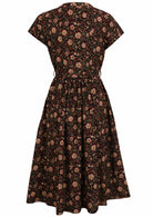 100% cotton printed dress with detachable waist tie and pockets.