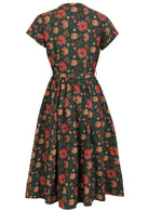 Back image of floral printed green cotton dress with waistband and mandarin collar.