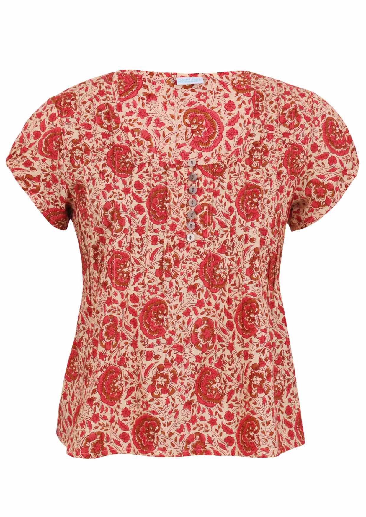 Cream based floral print 100% cotton top with coconut buttons.