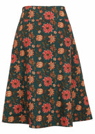 Midlength cotton zara skirt with wide waistband in cream, pink and orange florals on dark green background.