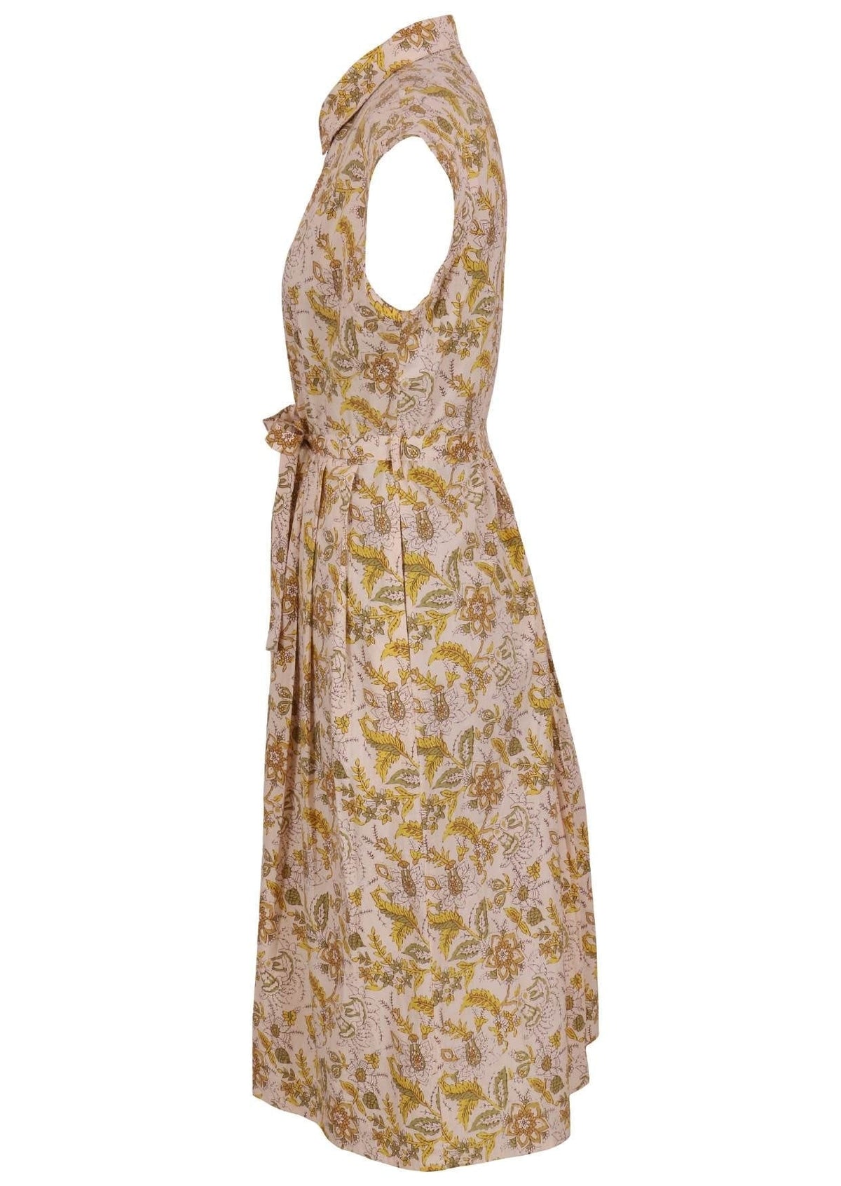 Side view of cream based floral print cotton dress with pockets.