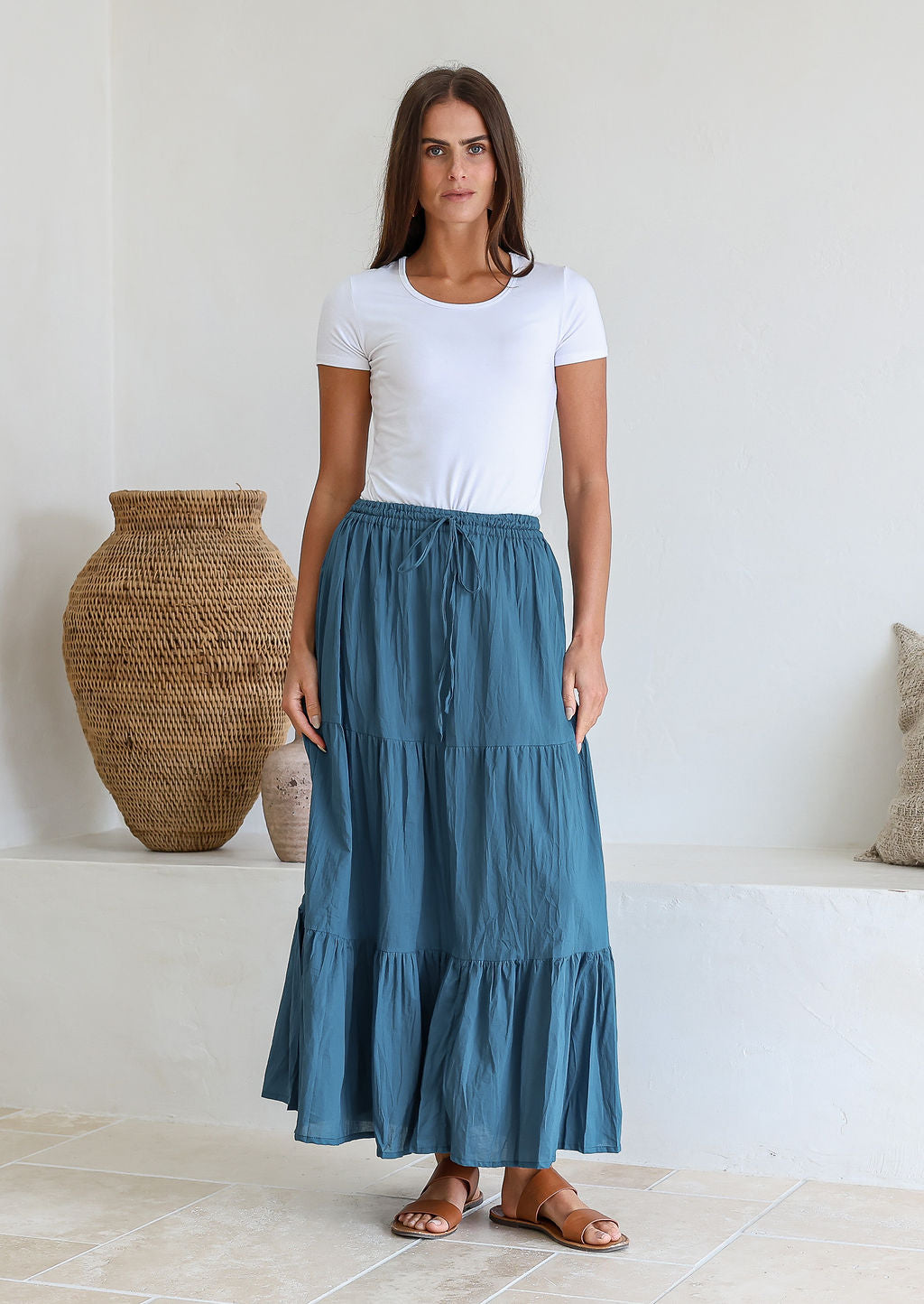Woman wearing a Maxi Skirt in plain deep blue shade, 100% cotton skirt with drawstring waistband