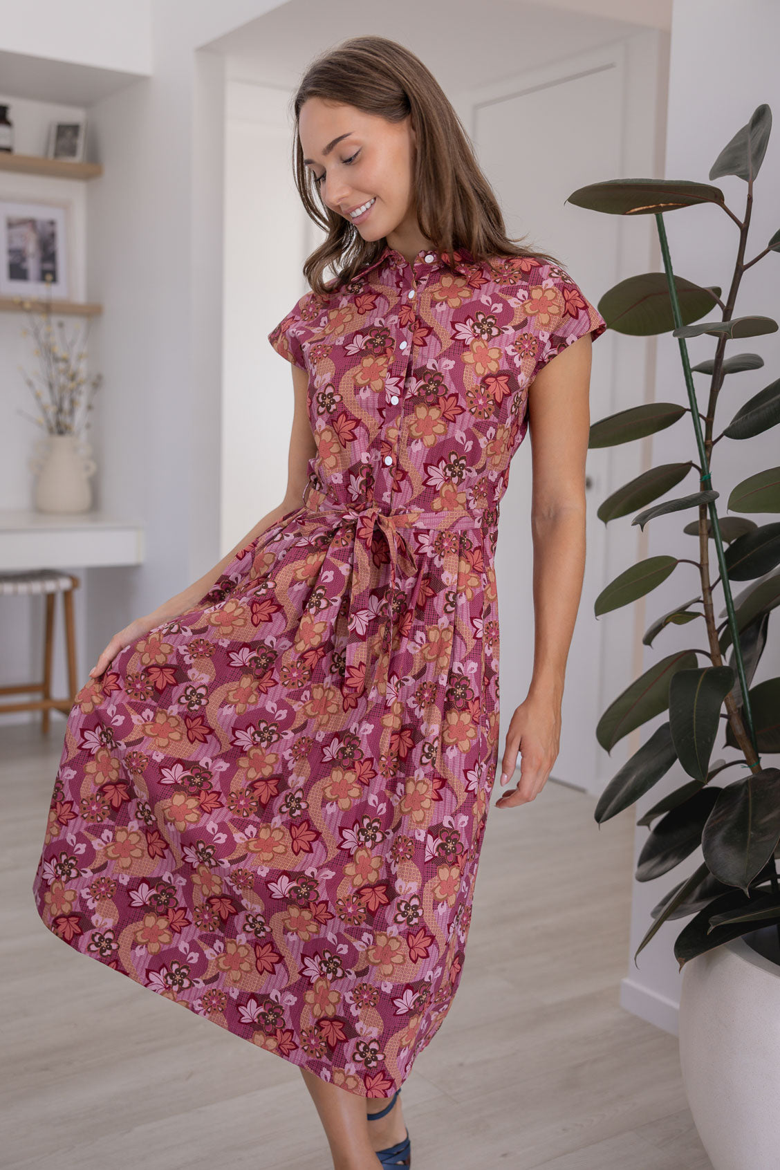 Model in a Japanese style floral print shirt style 100% cotton dress with cap sleeves and detachable waist tie
