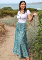 Model wearing rayon wide legged womens palazzo pant with elastic waist.