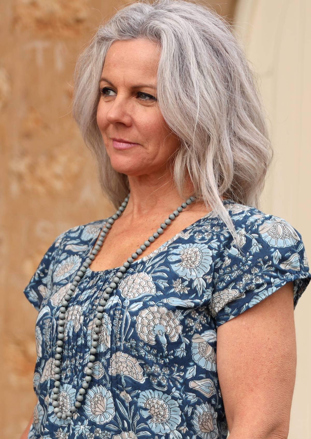 long single strand bead necklace grey