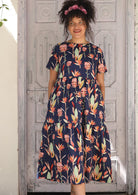 100% Cotton navy blue Midi Dress with short sleeves, high round neckline and pockets.
