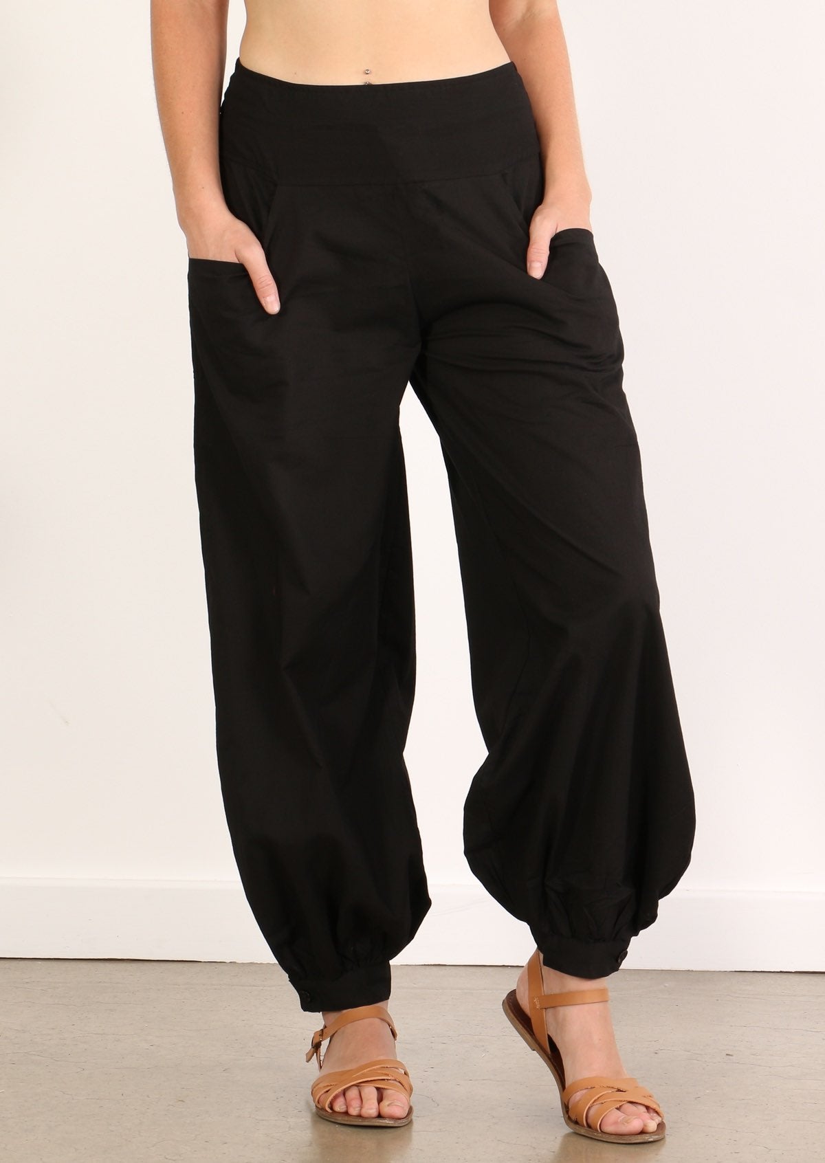 Close up of Aladdin 100% cotton pants in black