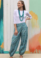 Model wearing 100% cotton harem pants with elasticated waist and ankles.