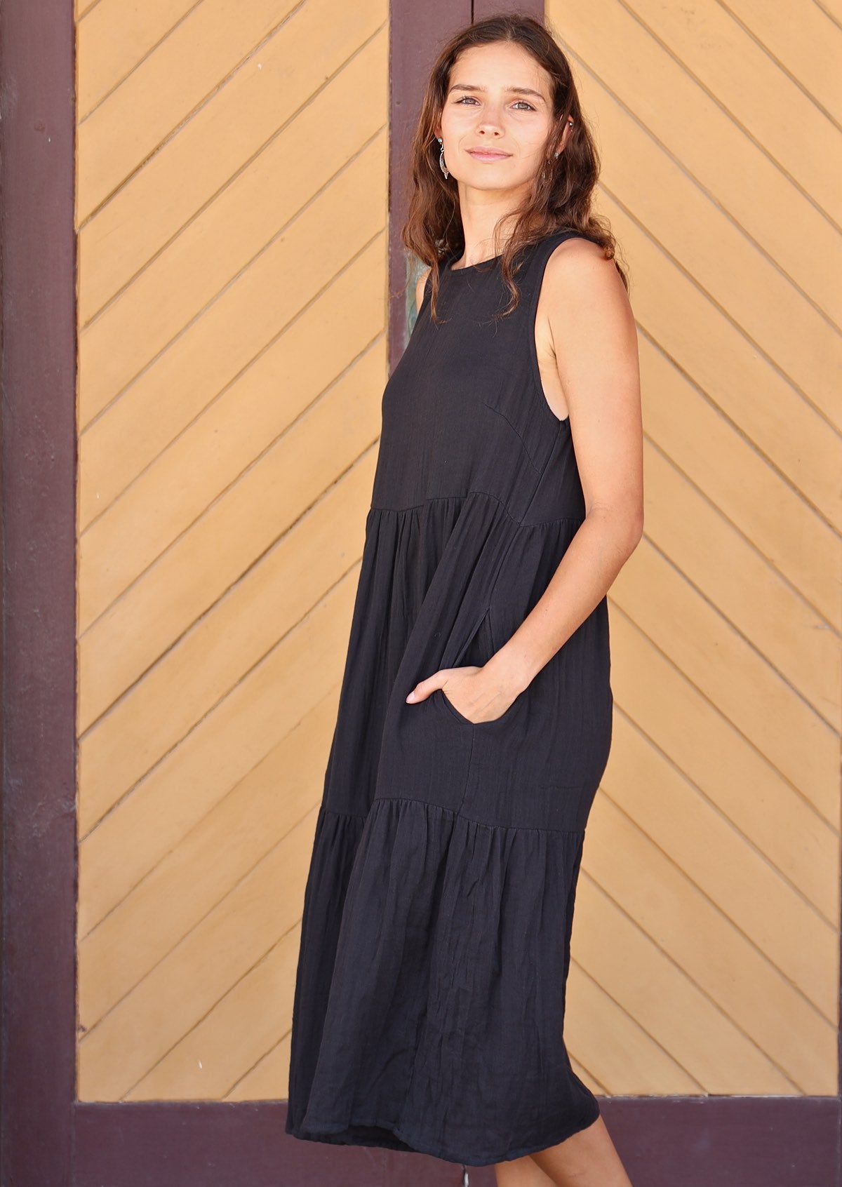 sleeveless midi dress with hidden side pockets