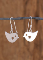 Sterling silver flat robin bird earrings with tiny heart cutout