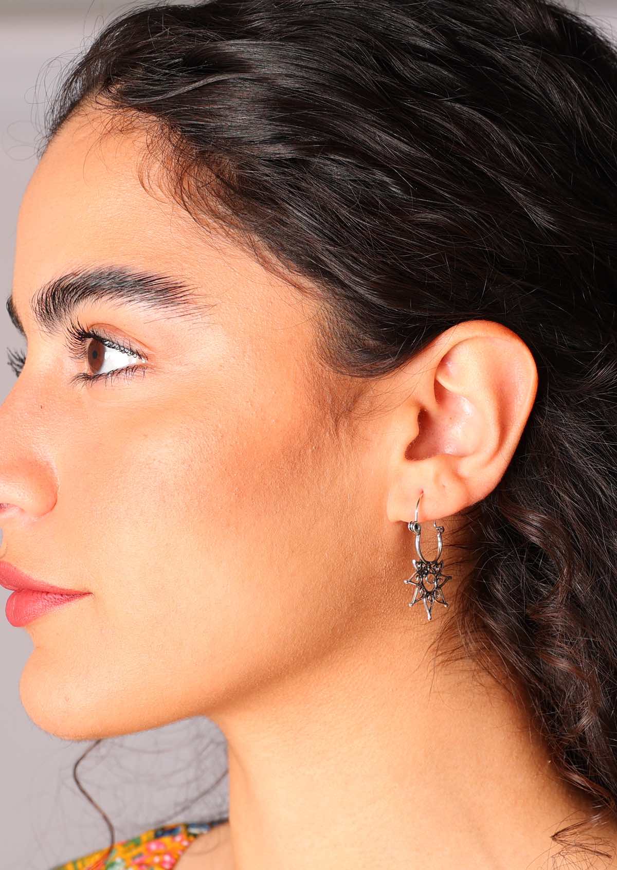Delicate silver earrings that make a statement