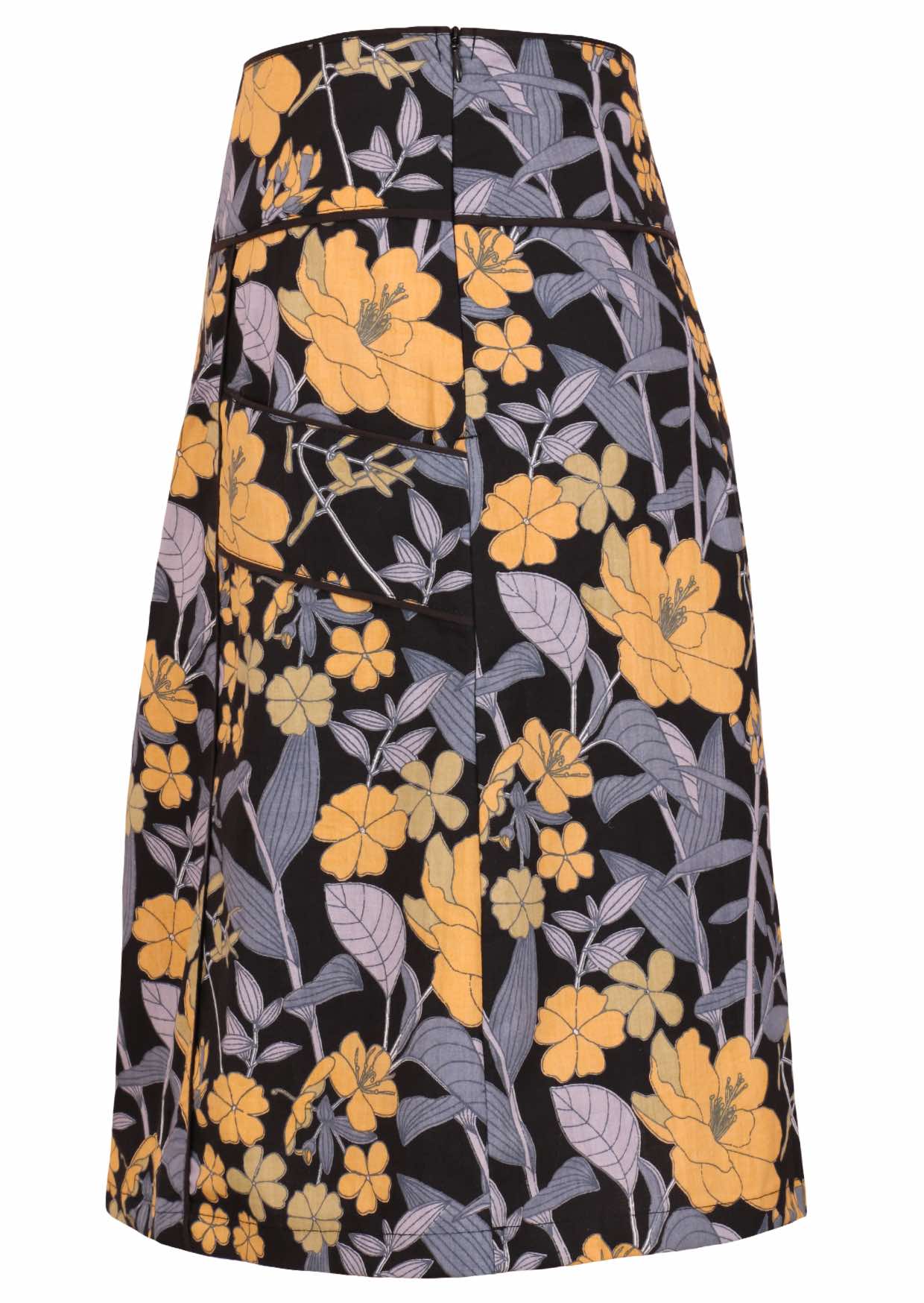Side view of black based floral print cotton A-line skirt with pockets and side zip