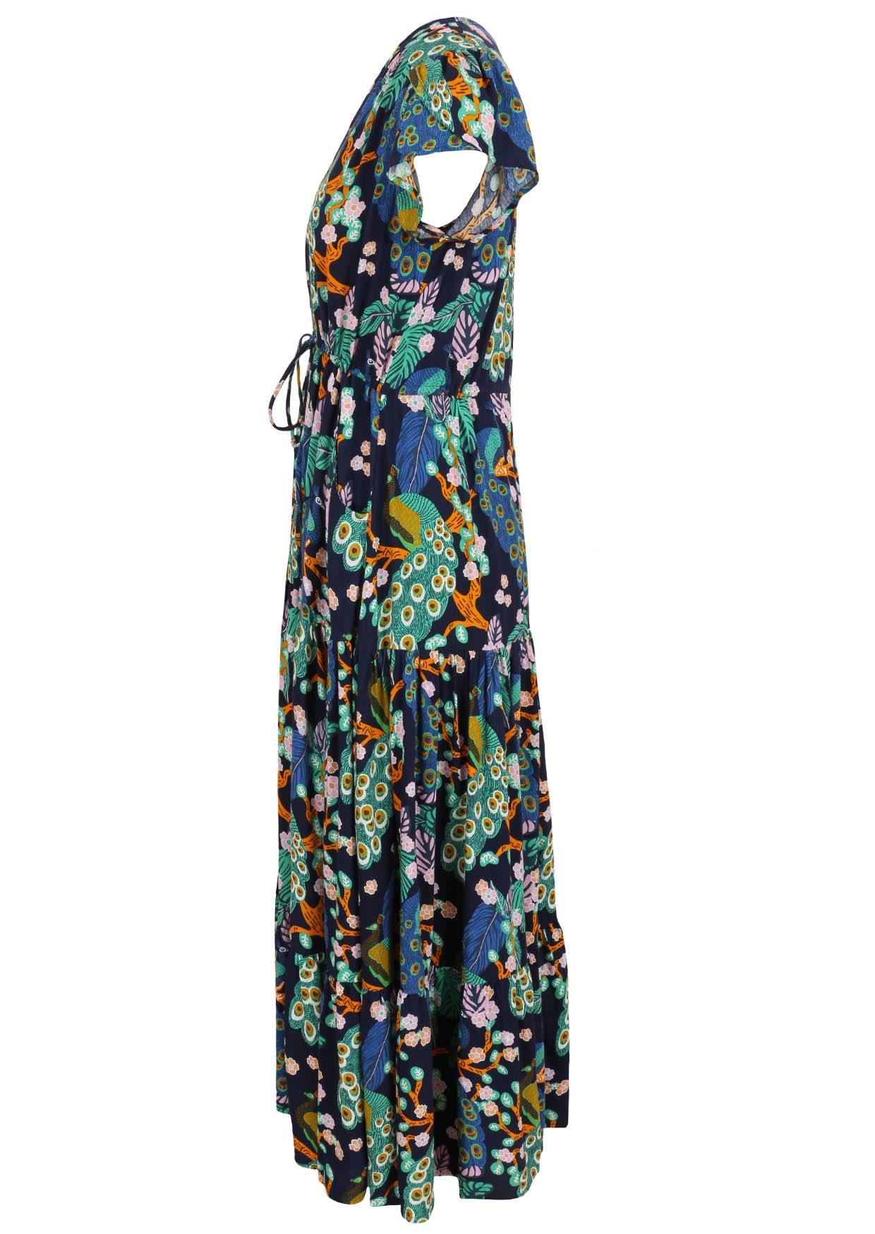 Side view of a rayon maxi dress with cap tulip sleeves and shoestring ties in a peacock print