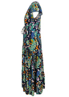Side view of a rayon maxi dress with cap tulip sleeves and shoestring ties in a peacock print