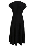 Back mannequin pic of black rayon maxi dress with tulip sleeves and voluminous, tiered skirt