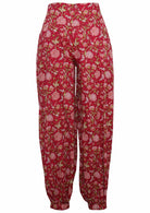 Front mannequin photo of red based floral print cotton harem pants with pockets