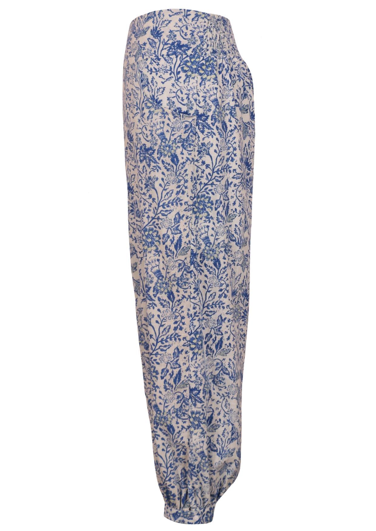 White based blue floral print harem pants with buttoned ankle and pockets