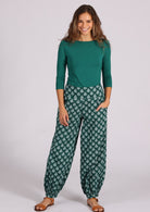 Lightweight cotton genie style pants with pockets and buttoned ankle