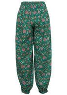 Back mannequin photo of jade green based floral print cotton harem pants with buttoned ankle