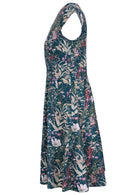 Side view of 100% cotton dress with delicate multicoloured wildflowers on a teal base.