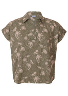 Front mannequin photo of cotton cap sleeve collared top in pale green based floral print