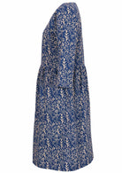 Blue and white cotton floral knee length sundress with sleeves side view
