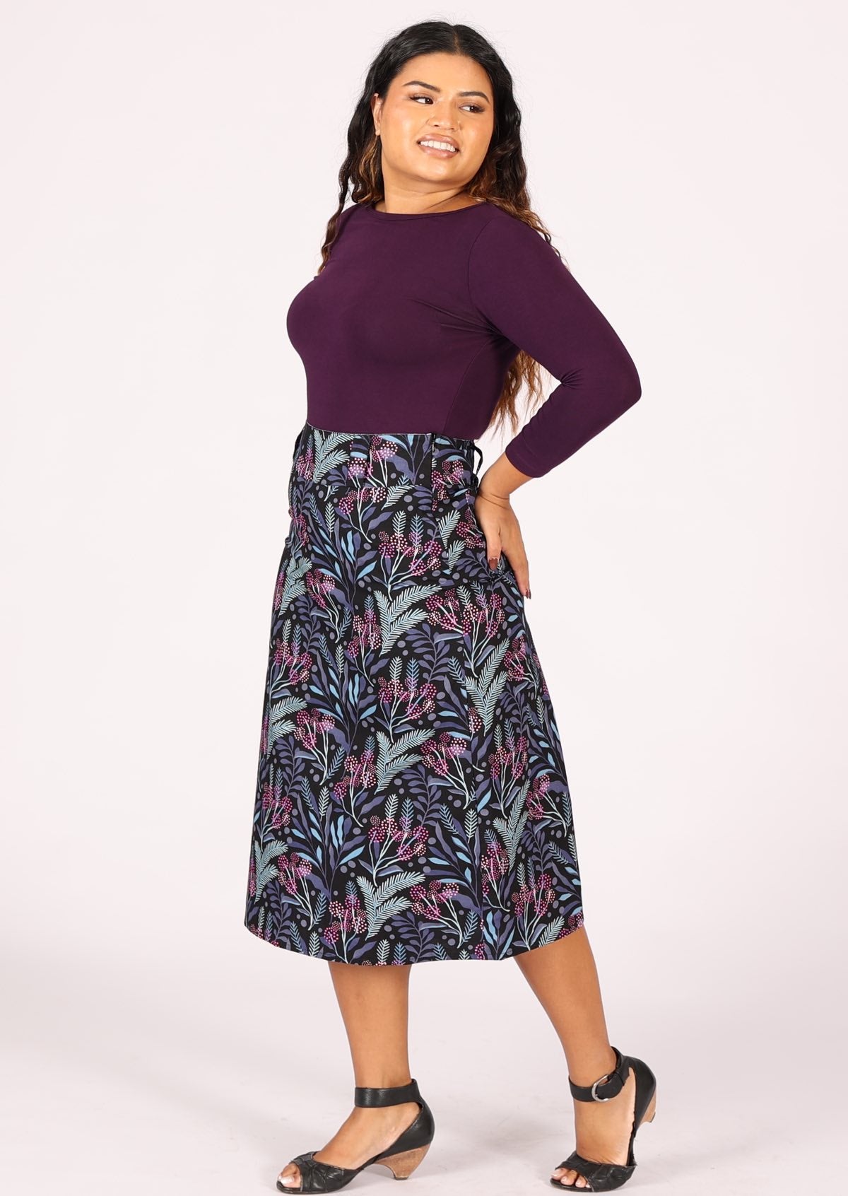 100% cotton shin length A-line skirt with belt loops and back pockets