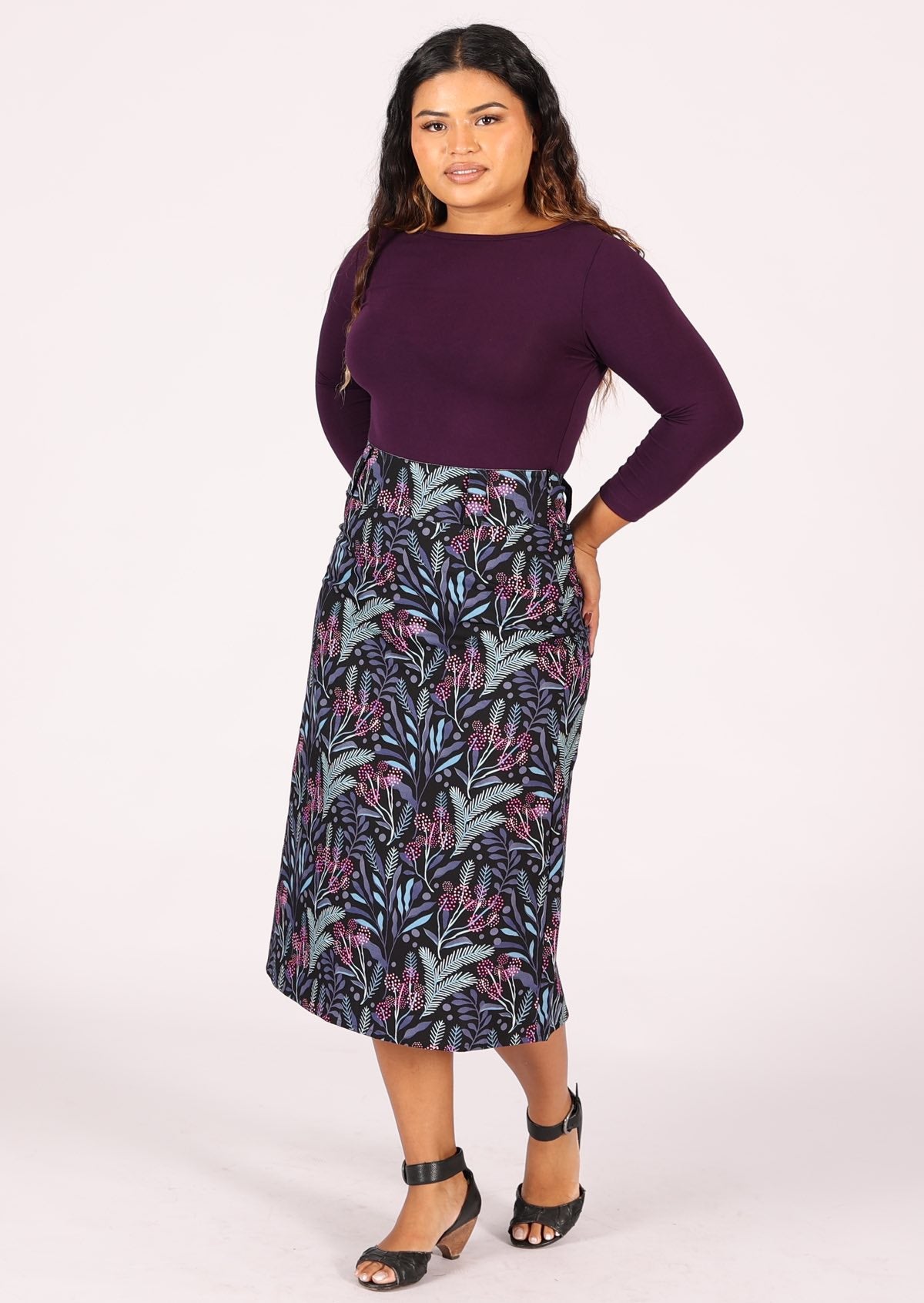 100% cotton midi length skirt with belt loops and back pockets