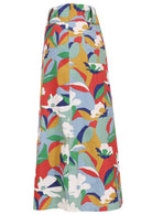 Side view of colorful floral patterned skirt on a white background