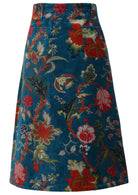 Back view of cotton velvet midi length A-line skirt with back pockets, in multi-coloured Jacobean floral print on a teal base