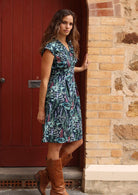 100% cotton dress with box peat detail under waistband that gives A-line skirt