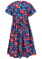Back view of a royal blue based floral cotton button through dress with short sleeves and shoestring waist ties