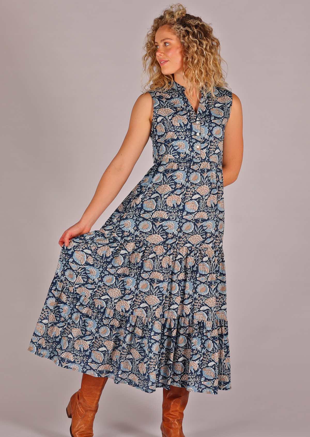 On trend cotton sleeveless maxi dress with tiers of fabric in the skirt