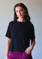 woman in loose fit black t-shirt 