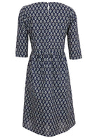 Below knee length 100% cotton dress in navy blue based floral print with 3/4 sleeves and keyhole button closure at the back.