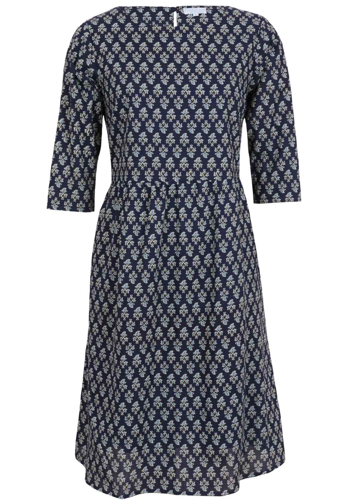 Lightweight cotton below knee length dress with 3/4 sleeves and round neckline in navy blue based floral print.