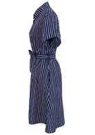 100% cotton shirt style maxi dress with removable fabric waist tie and side pockets in a navy blue based print