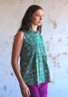 woman wearing green Indian cotton floral blouse 